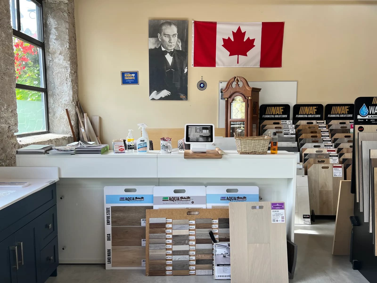 The showroom's service counter, with the Reader Favourite 2025 certificate framed on the wall behind it.